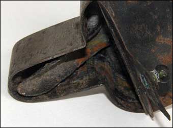 Early Lighting - Channel of iron inside the Betty lamp